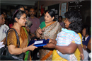 Parent of Pw.M.Ds presenting memento to Hon'ble Secretary