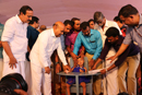 A child with Cerebral Palsy receiving corner chair from Hon’ble Union Minister.