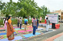 Yoga Proffessionals Teaching Asanas To Staff.