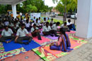 Yoga Teacher Teaching Yoga To Persons with Disabilities.