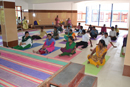 Adult with special needs performing yoga