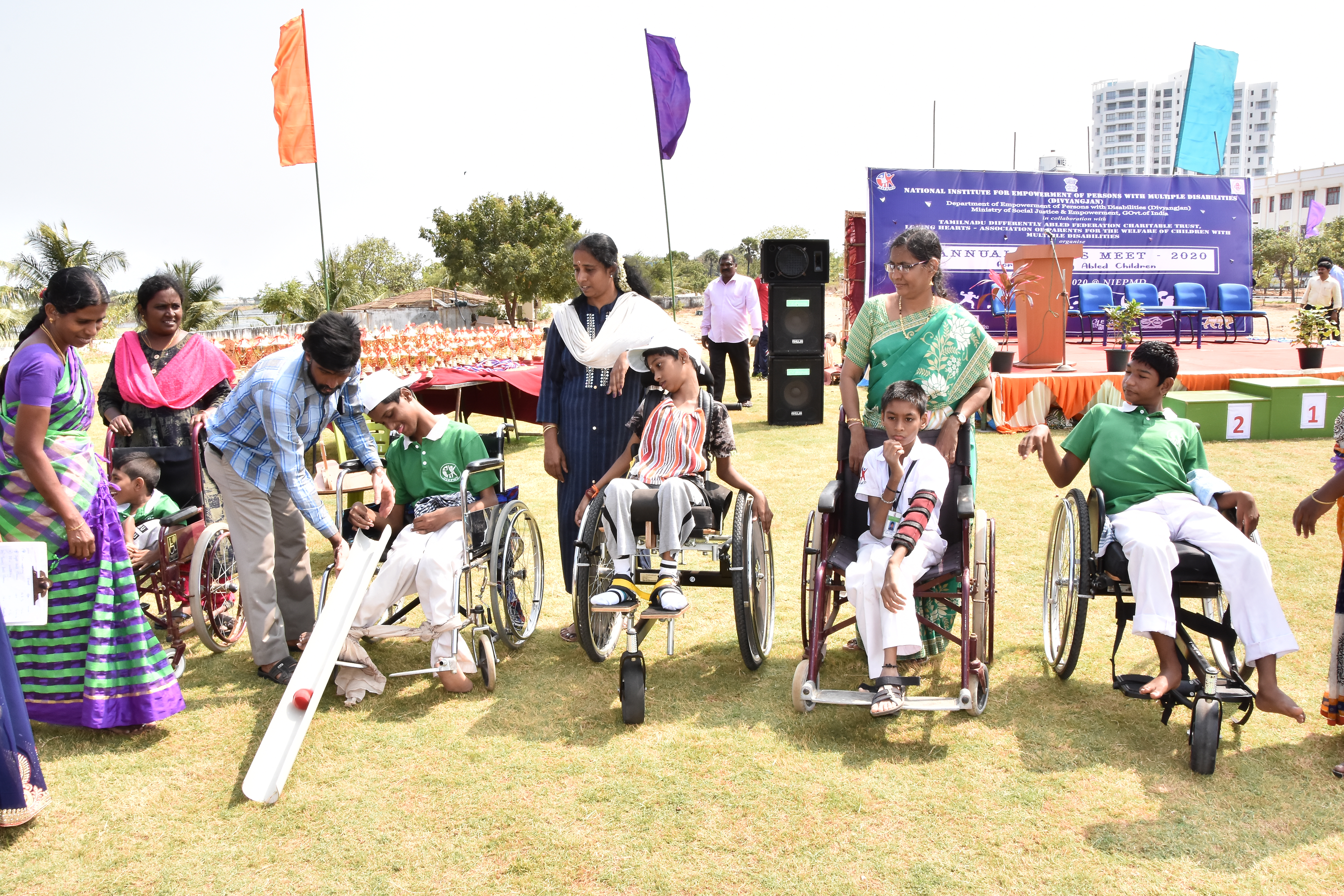 PwD actively taking part in Rolling the ball with slider event